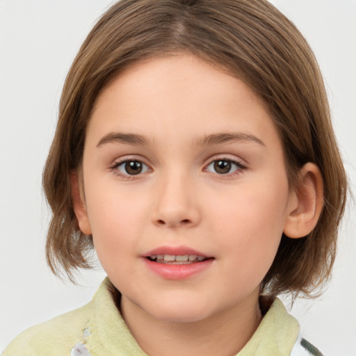 Joyful white child female with medium  brown hair and brown eyes