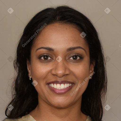 Joyful latino young-adult female with medium  brown hair and brown eyes