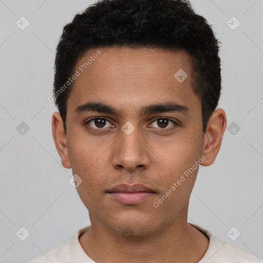 Neutral latino young-adult male with short  black hair and brown eyes