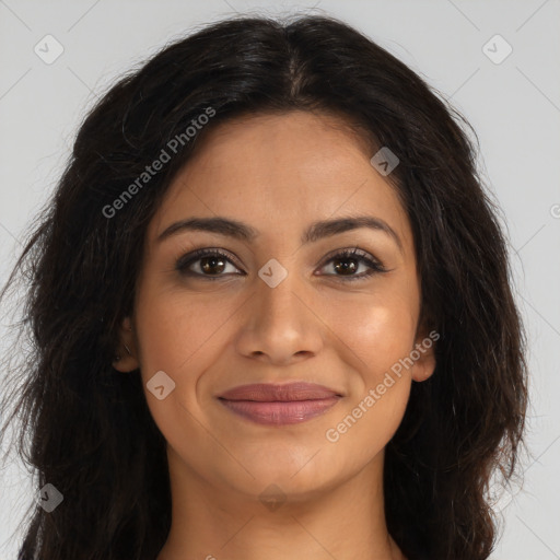 Joyful latino young-adult female with long  brown hair and brown eyes