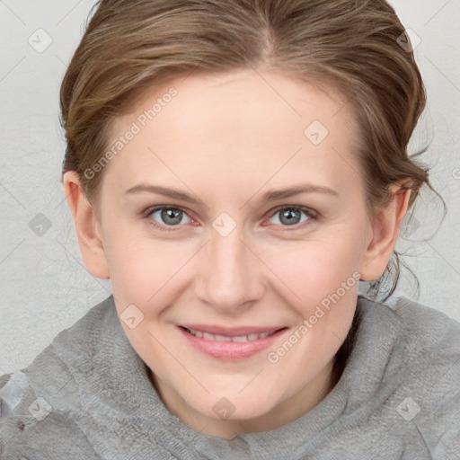 Joyful white young-adult female with medium  brown hair and blue eyes