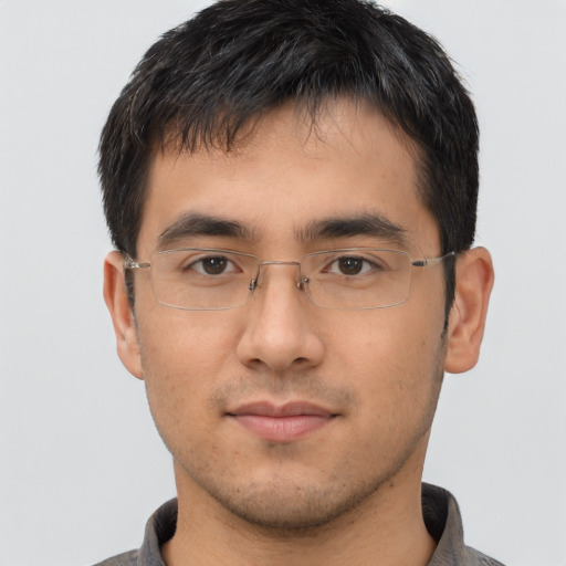 Neutral asian young-adult male with short  brown hair and brown eyes