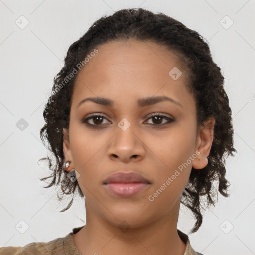 Neutral black young-adult female with medium  brown hair and brown eyes