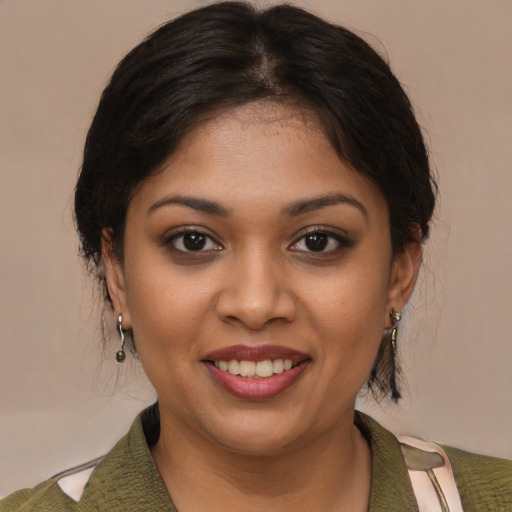Joyful white young-adult female with medium  brown hair and brown eyes