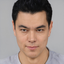 Neutral asian young-adult male with short  black hair and brown eyes