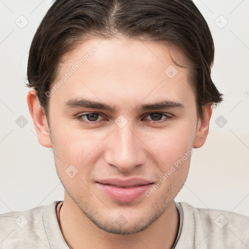 Joyful white young-adult male with short  brown hair and brown eyes