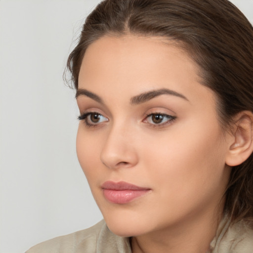 Neutral white young-adult female with medium  brown hair and brown eyes