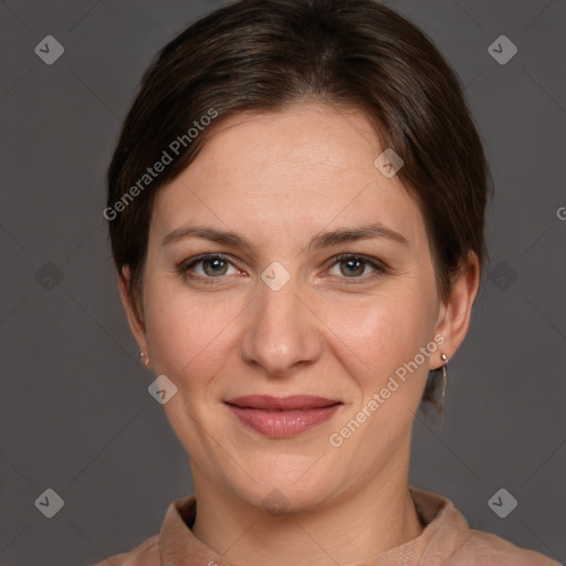 Joyful white adult female with medium  brown hair and grey eyes