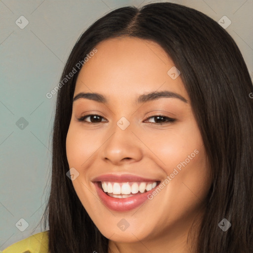 Joyful white young-adult female with long  black hair and brown eyes