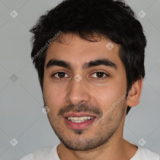 Joyful white young-adult male with short  black hair and brown eyes