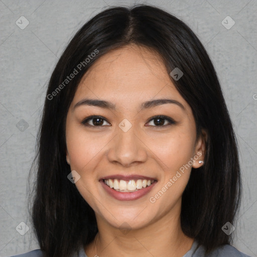 Joyful asian young-adult female with long  brown hair and brown eyes