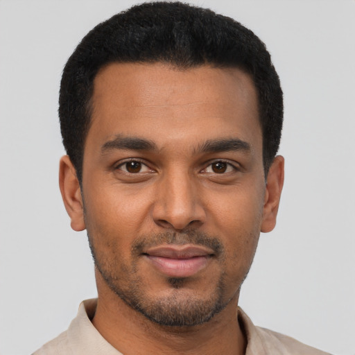 Neutral black young-adult male with short  black hair and brown eyes