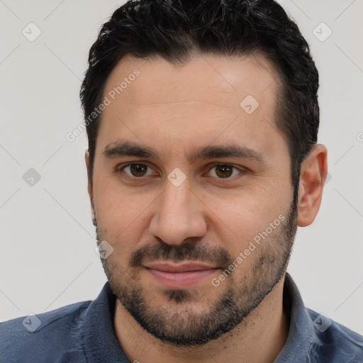 Joyful white young-adult male with short  brown hair and brown eyes