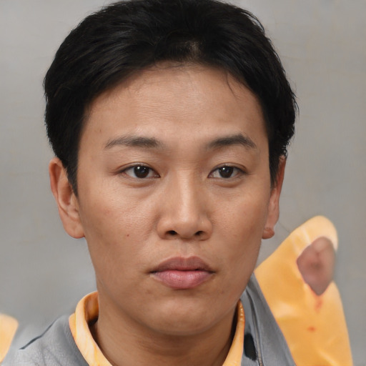 Neutral asian young-adult female with short  brown hair and brown eyes