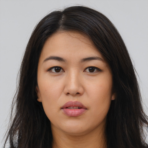 Neutral latino young-adult female with long  brown hair and brown eyes