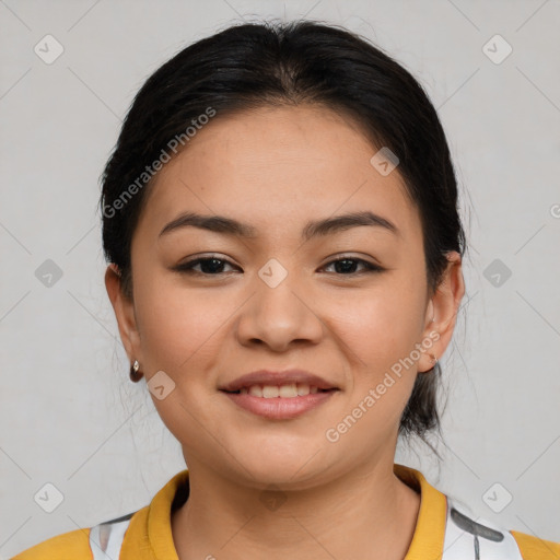 Joyful latino young-adult female with medium  brown hair and brown eyes