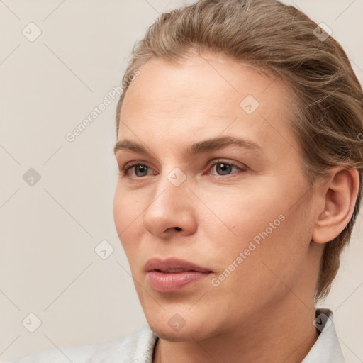 Neutral white young-adult female with short  brown hair and brown eyes