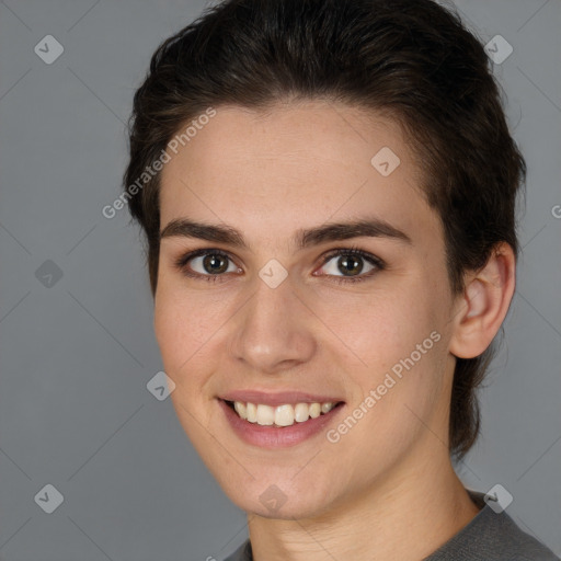 Joyful white young-adult female with medium  brown hair and brown eyes