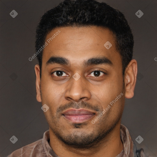 Joyful latino young-adult male with short  black hair and brown eyes