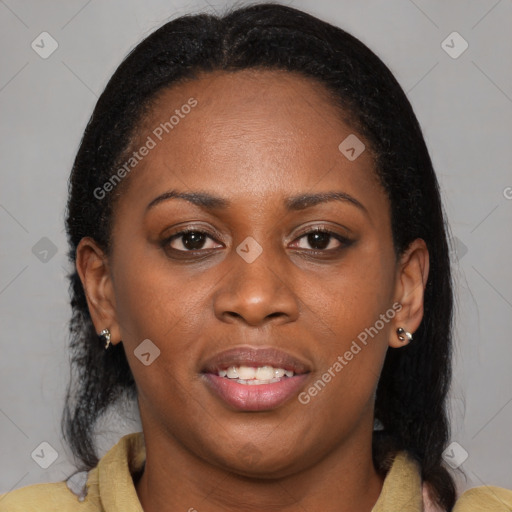 Joyful black young-adult female with medium  brown hair and brown eyes