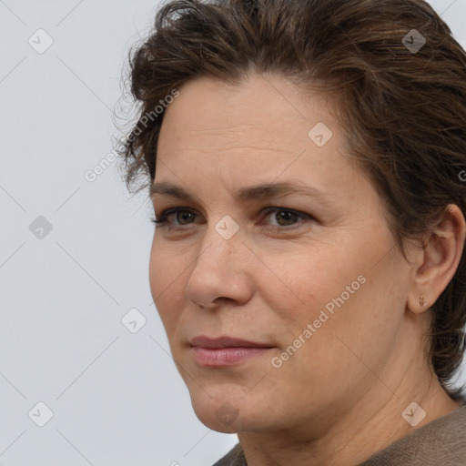 Neutral white adult female with medium  brown hair and brown eyes