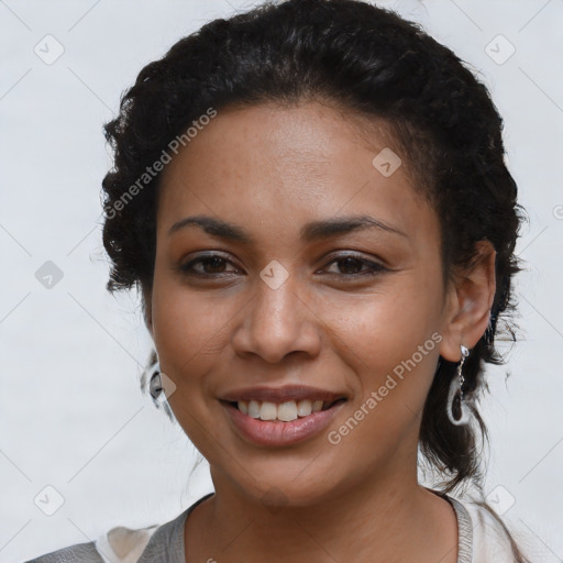 Joyful latino young-adult female with short  brown hair and brown eyes