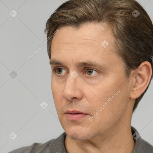 Neutral white adult male with short  brown hair and brown eyes