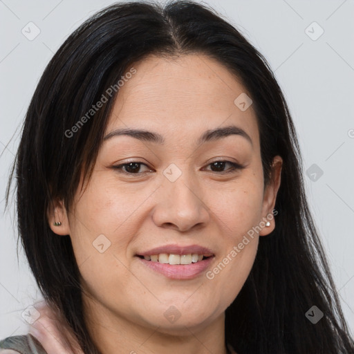 Joyful asian young-adult female with long  brown hair and brown eyes