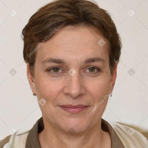 Joyful white adult female with short  brown hair and grey eyes