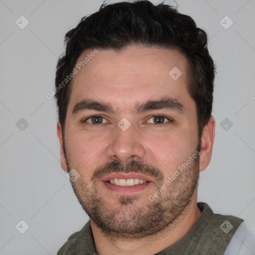 Joyful white young-adult male with short  black hair and brown eyes