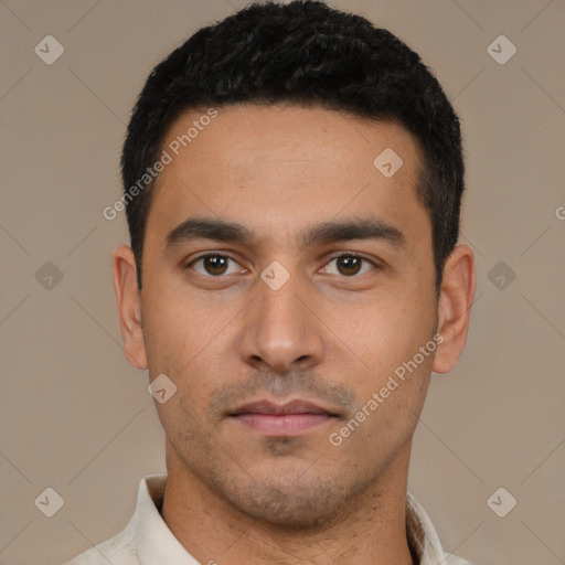 Neutral white young-adult male with short  black hair and brown eyes