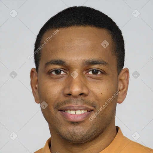 Joyful latino young-adult male with short  brown hair and brown eyes