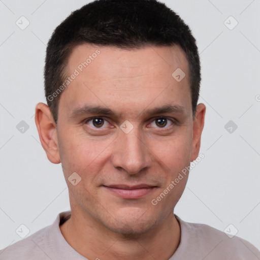 Joyful white young-adult male with short  brown hair and brown eyes