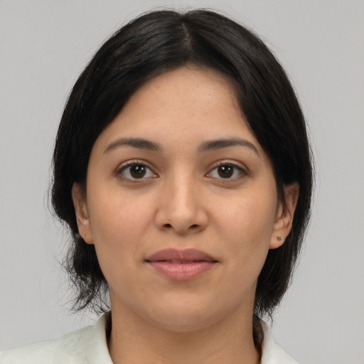 Joyful asian young-adult female with medium  black hair and brown eyes