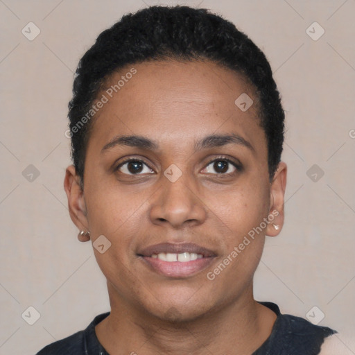 Joyful black young-adult female with short  black hair and brown eyes