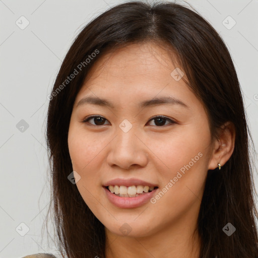 Joyful white young-adult female with long  brown hair and brown eyes