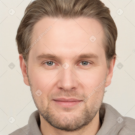 Joyful white adult male with short  brown hair and grey eyes