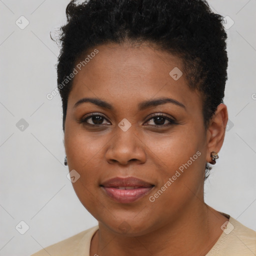 Joyful black young-adult female with short  brown hair and brown eyes