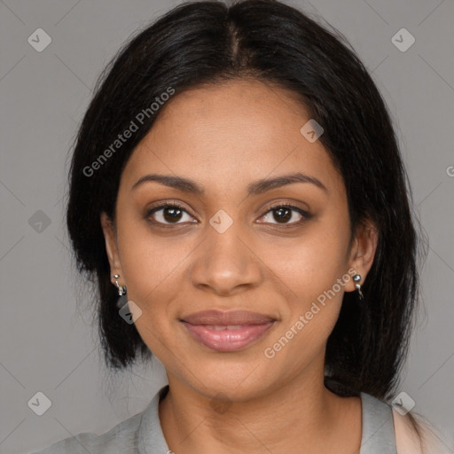 Joyful black young-adult female with medium  brown hair and brown eyes