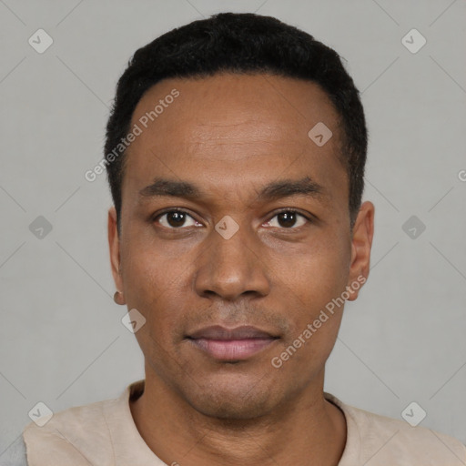 Neutral latino young-adult male with short  black hair and brown eyes