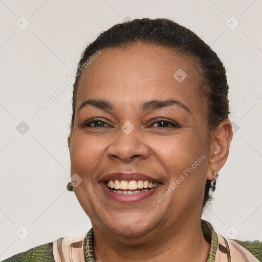 Joyful white adult female with short  brown hair and brown eyes