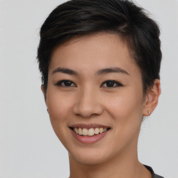 Joyful asian young-adult female with short  brown hair and brown eyes