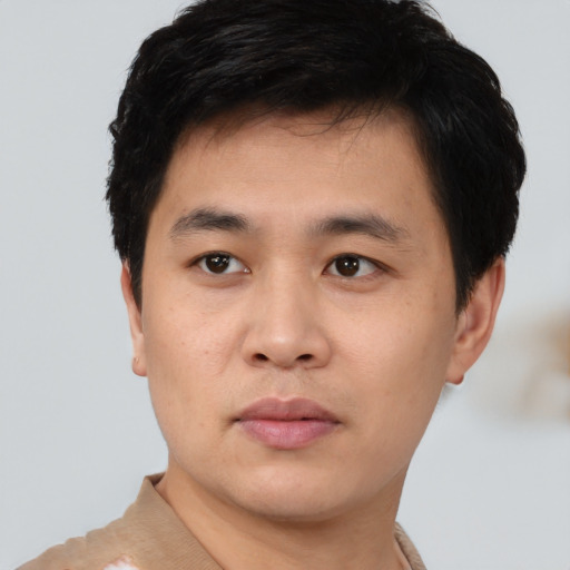 Neutral white young-adult male with short  black hair and brown eyes