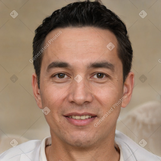 Joyful white adult male with short  black hair and brown eyes