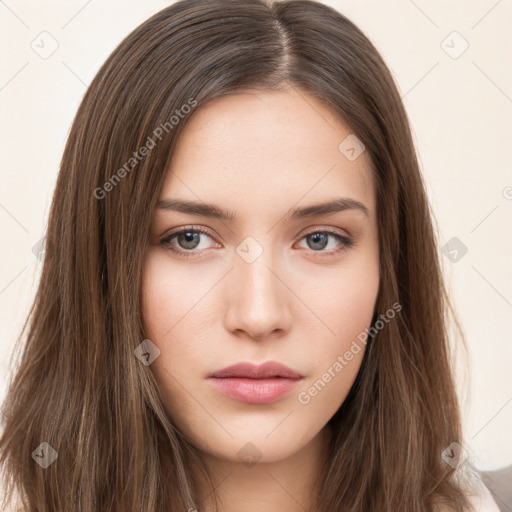 Neutral white young-adult female with long  brown hair and brown eyes