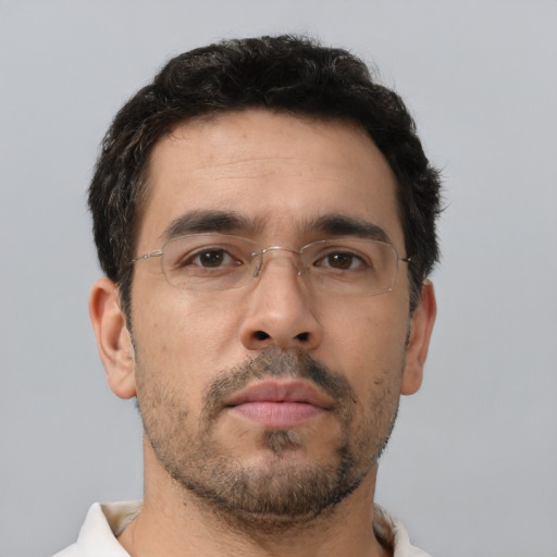 Neutral white adult male with short  brown hair and brown eyes