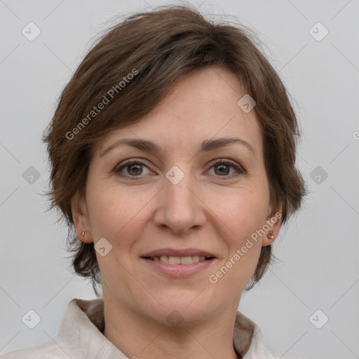 Joyful white adult female with medium  brown hair and grey eyes