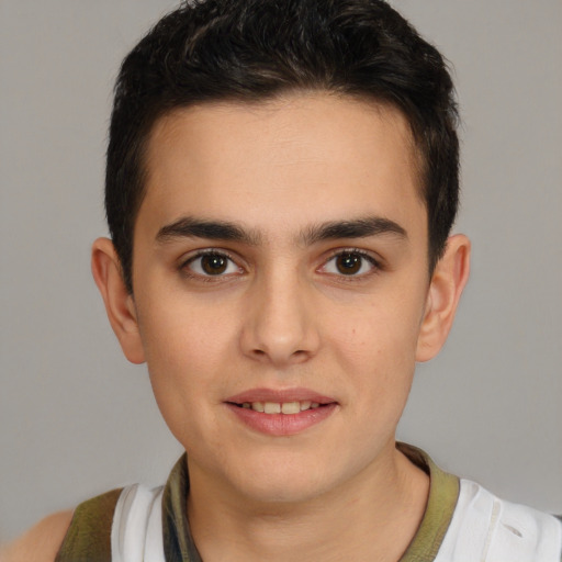 Joyful white young-adult male with short  brown hair and brown eyes