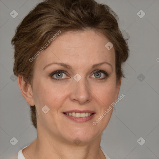 Joyful white adult female with short  brown hair and grey eyes