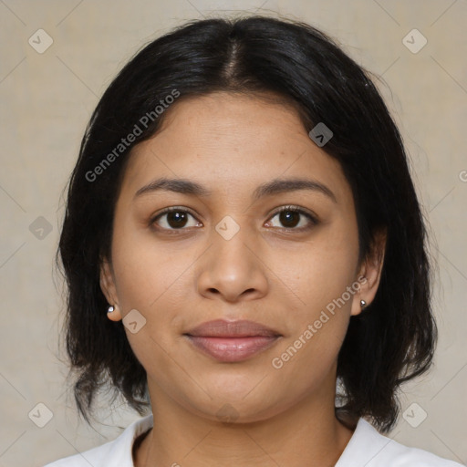 Joyful latino young-adult female with medium  black hair and brown eyes